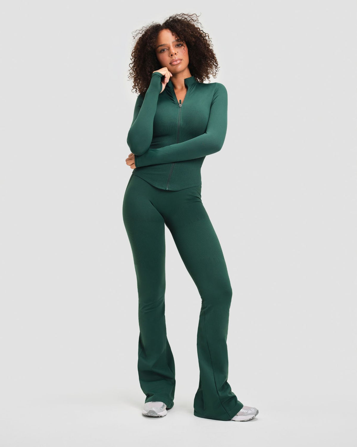 Elevate Compression Long Sleeve Jacket in Pine Green, full-length front view of the zipped workout jacket with stand collar