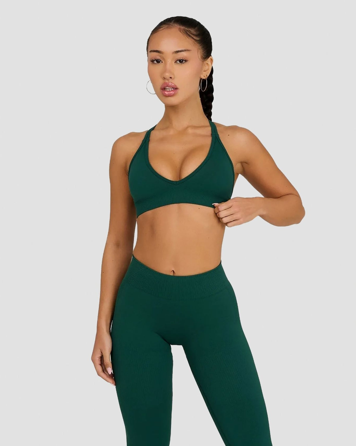 Elevate Sculpting Seamless High Apex Bra in Pine Green, front view of plunging V-neckline and racer-style straps