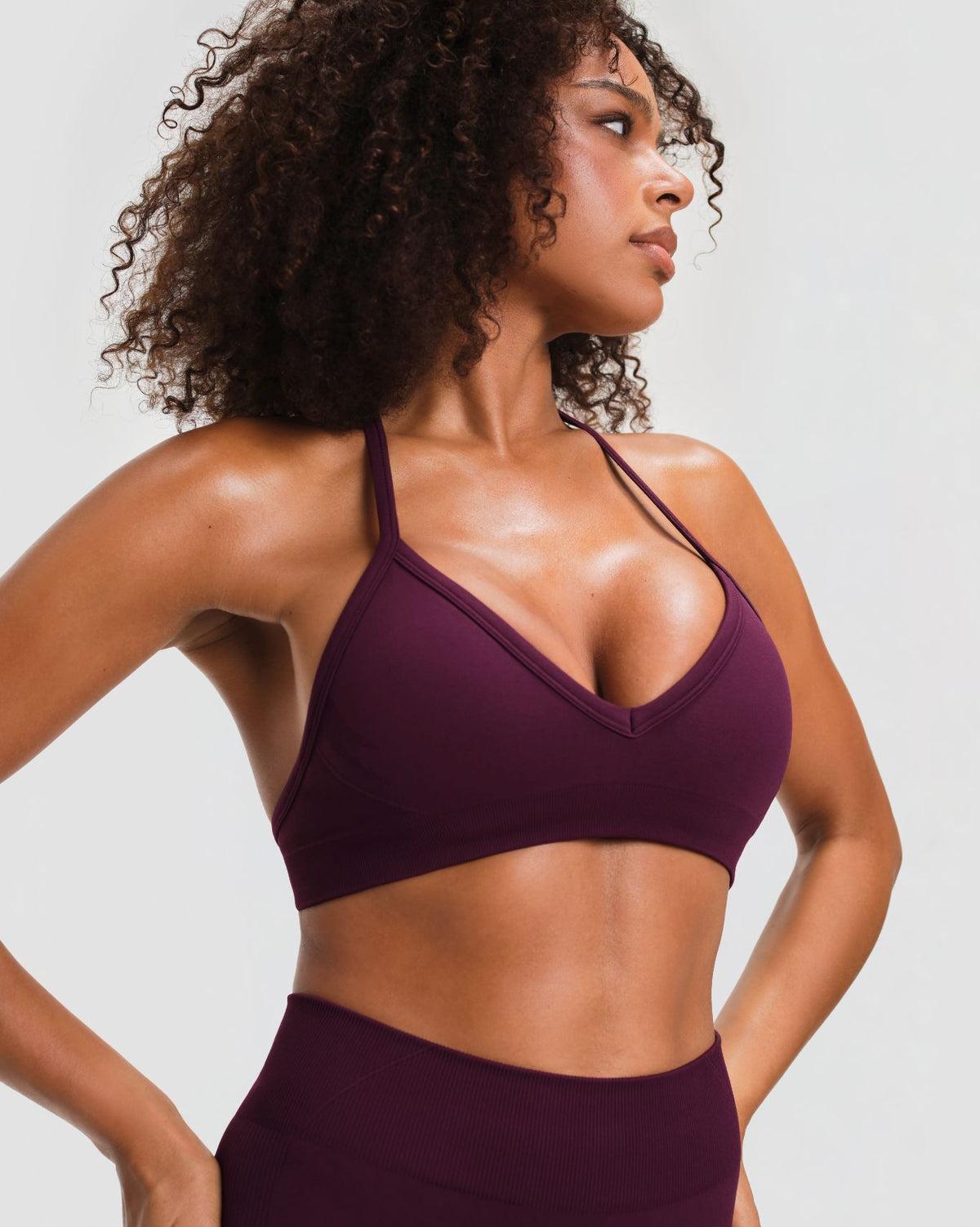 Elevate Sculpting Seamless Adjustable Halter Bra in Winter Plum Red, three-quarter front close-up of halter straps