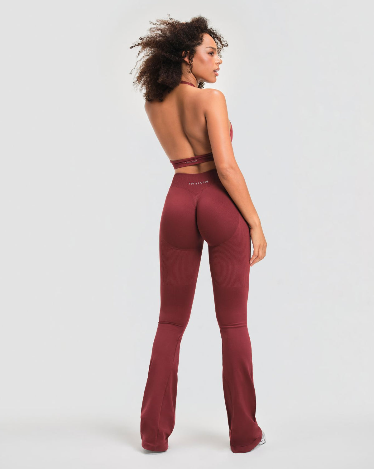 Elevate™ Sculpting Mid V-Waist Flare Leggings | Fine Wine
