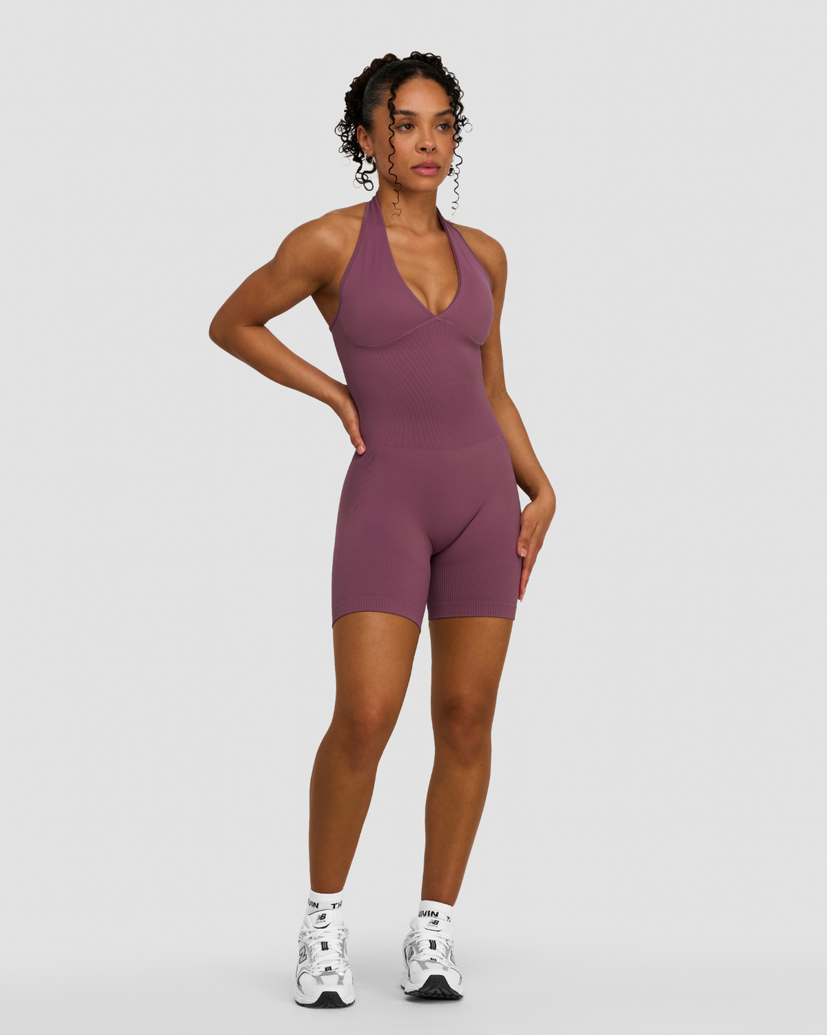 Elevate Sculpting Halterneck All In One in Orchid Mauve, full-length front view with halter neck and V-neckline