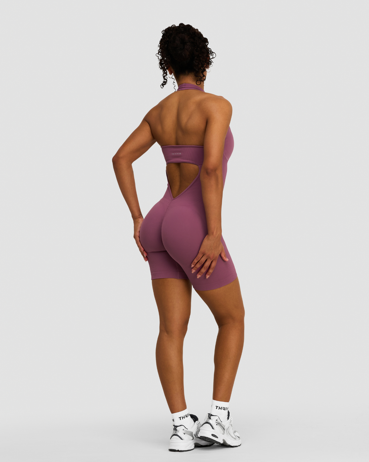 Elevate Sculpting Halterneck All In One in Orchid Mauve, full-length back view with halter neck, open back and scrunch seam