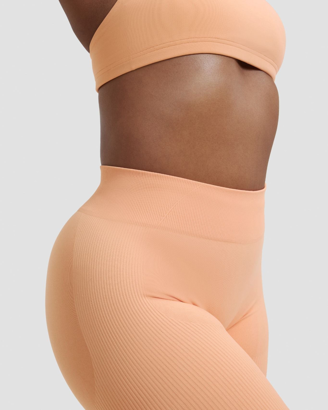 Elevate™ Sculpting Mid Waist Scrunch Leggings | Melon Ice