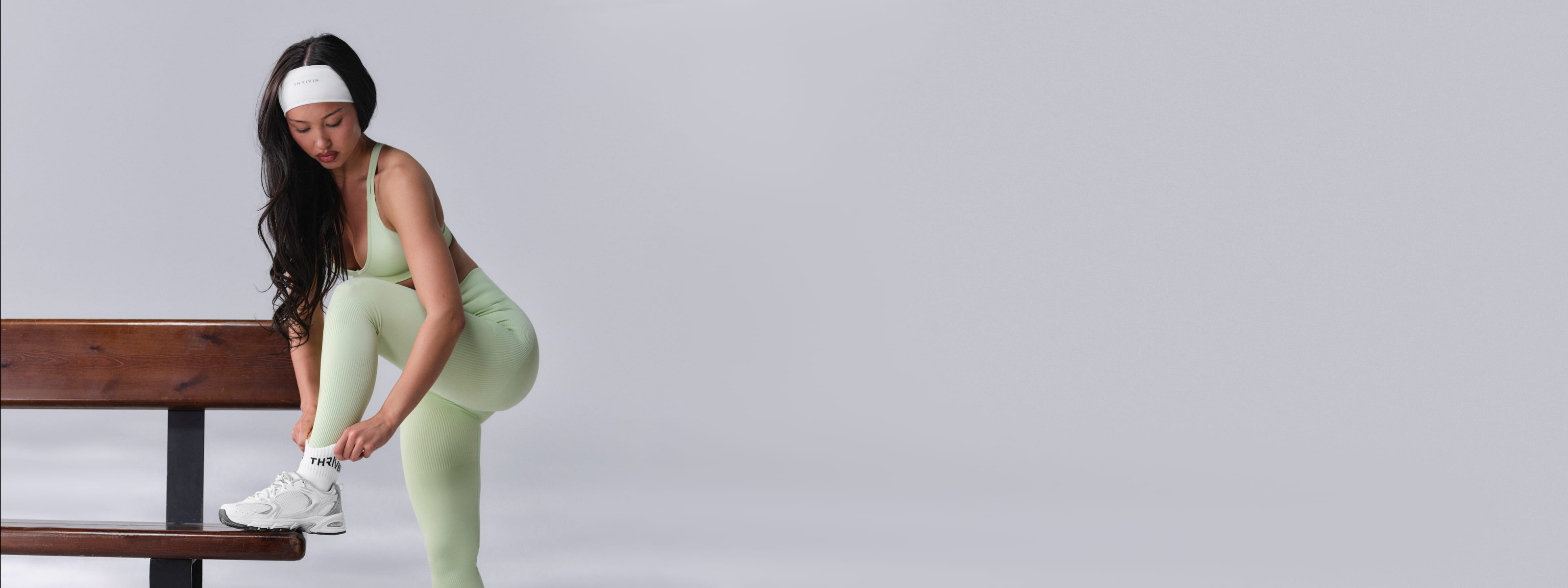 Banner of pale green sports bra and gym leggings set