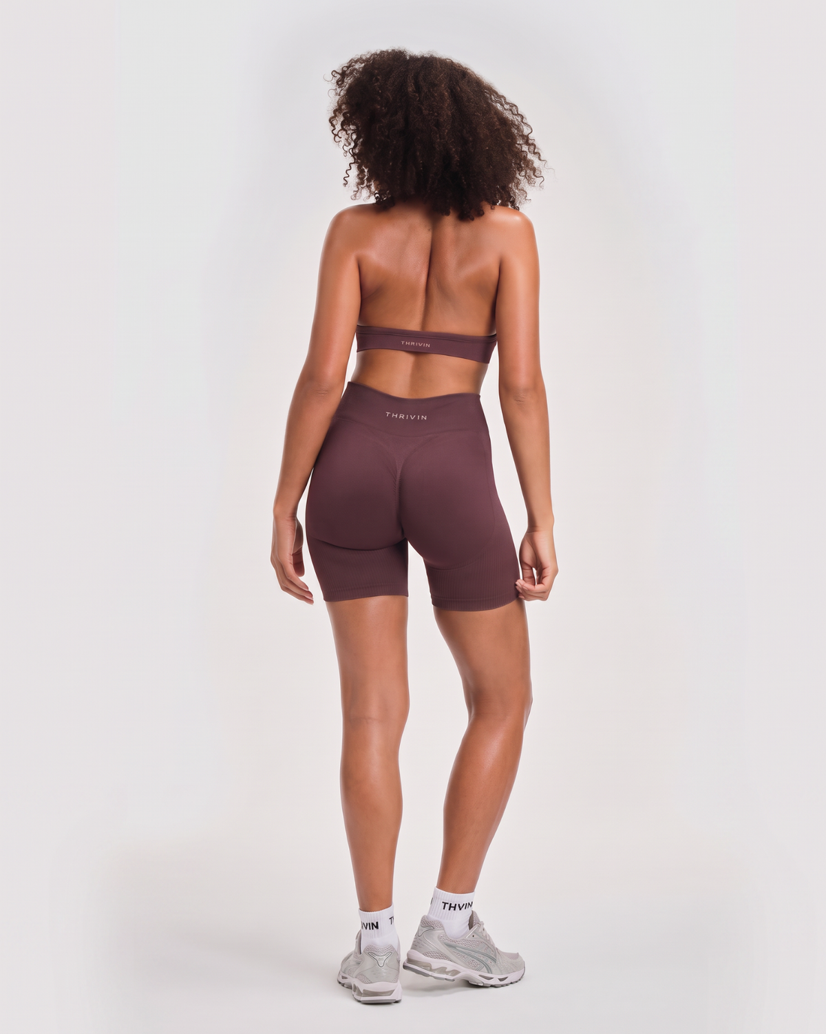 The Wrapped Up 3-Piece Bundle, back view of Dark Mauve halter bra with minimal THRIVIN logo band and matching shorts