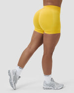 Elevate™ Sculpting Mid Waist Scrunch Shorter Shorts | Banana
