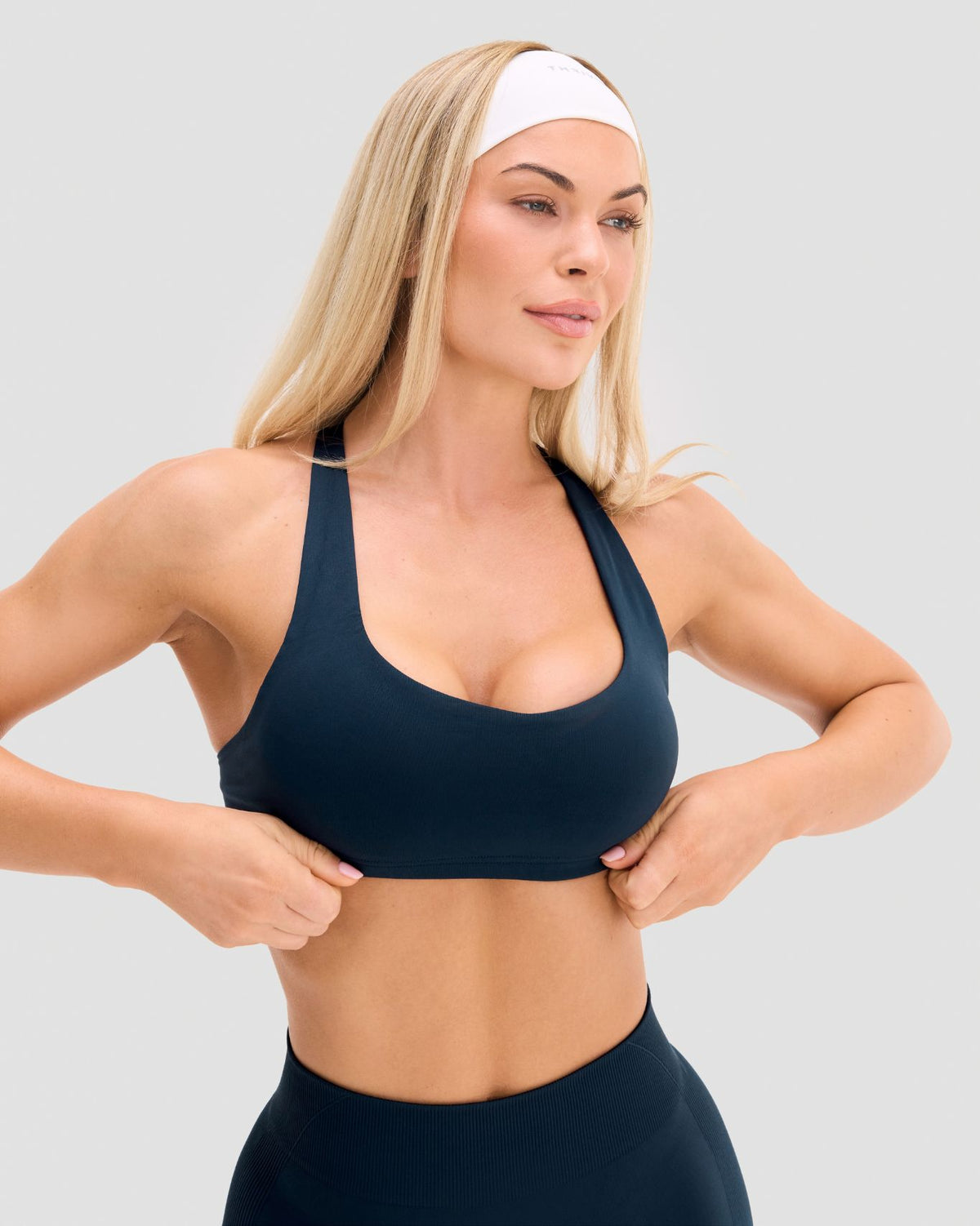 Elevate Sculpting Medium Impact Multiway Bra in Midnight Navy Blue, front view with scoop neckline and straight straps