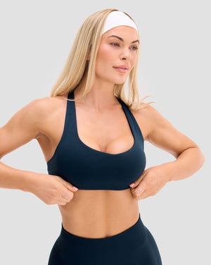 Elevate Sculpting Medium Impact Multiway Bra in Midnight Navy Blue, front view with scoop neckline and straight straps