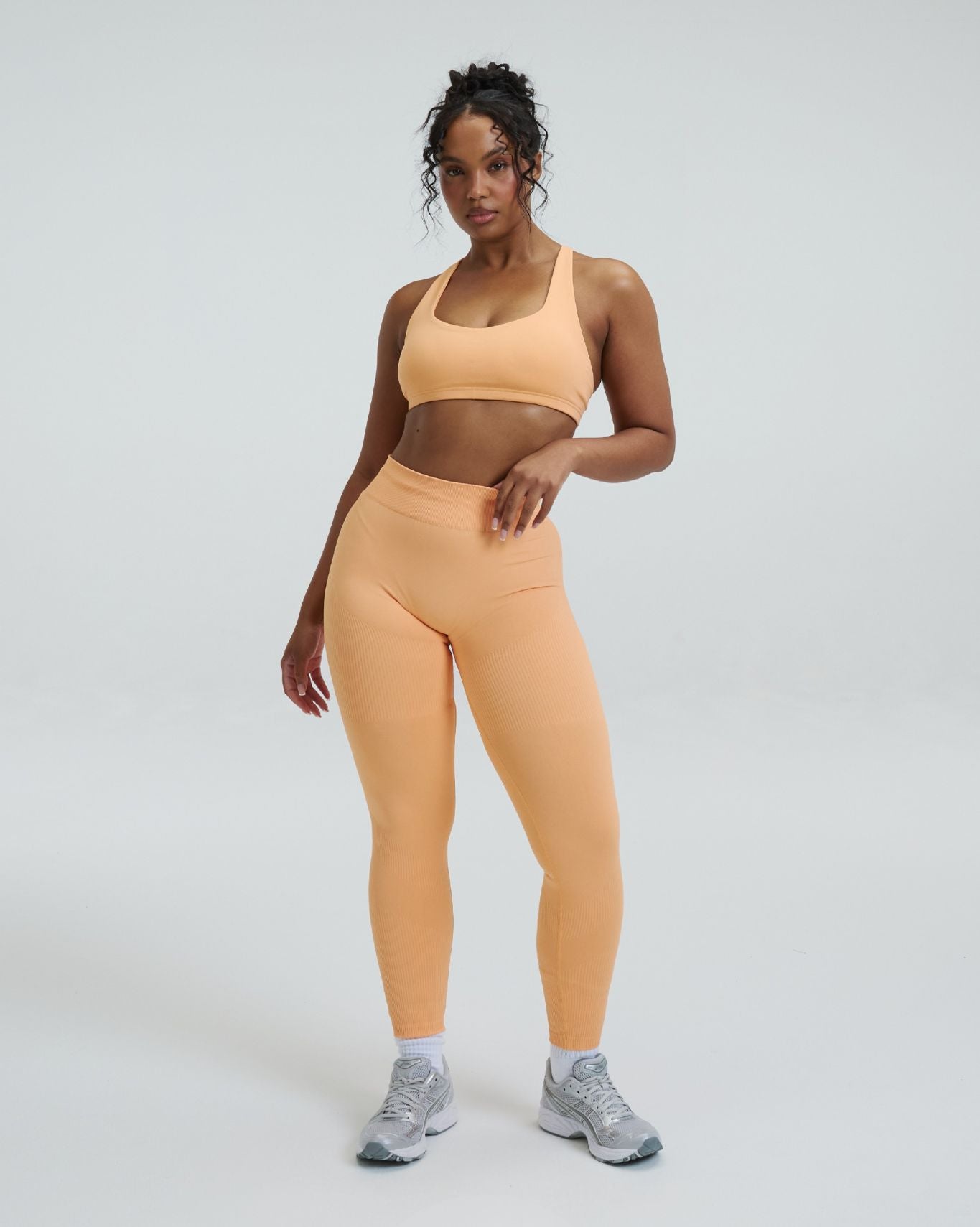 Elevate™ Leggings de modelado de cintura media con fruncido | Melón
