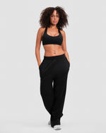 Original Straight Leg Jogger in Night Black, full-length front view of the side pockets and relaxed straight leg fit