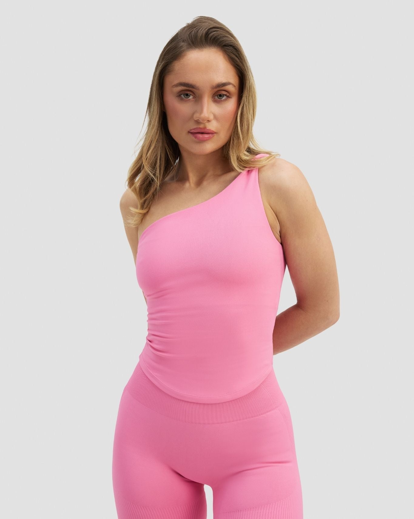 Elevate™ Sculpting Asymmetric Twist Top | Bubble Pink