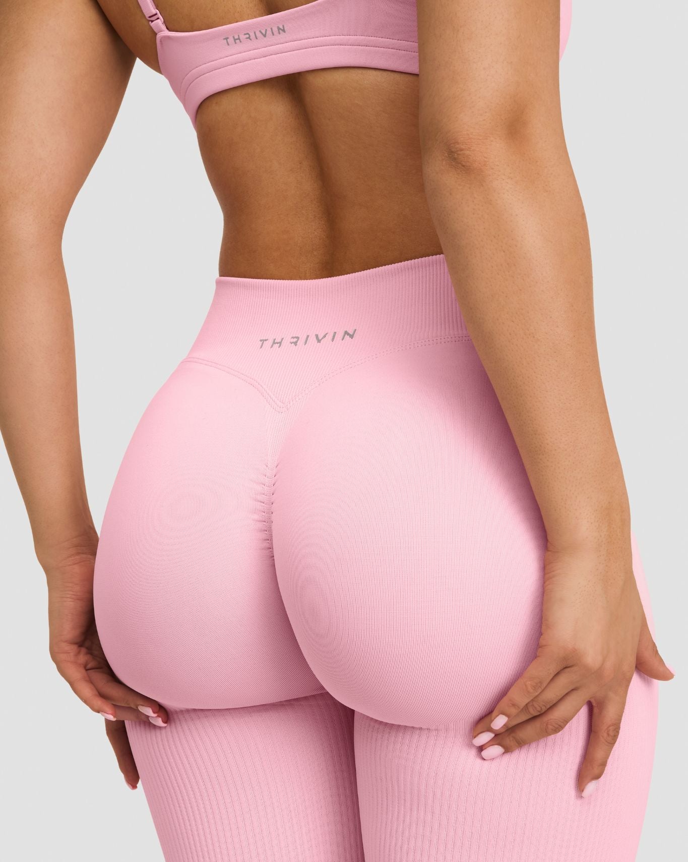 Sculpting Mid V-Waist Scrunch Flared Leggings - Cotton Pink | Thrivin