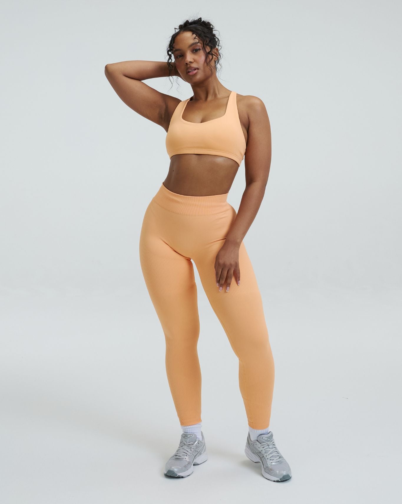 Elevate™ Leggings de modelado de cintura media con fruncido | Melón