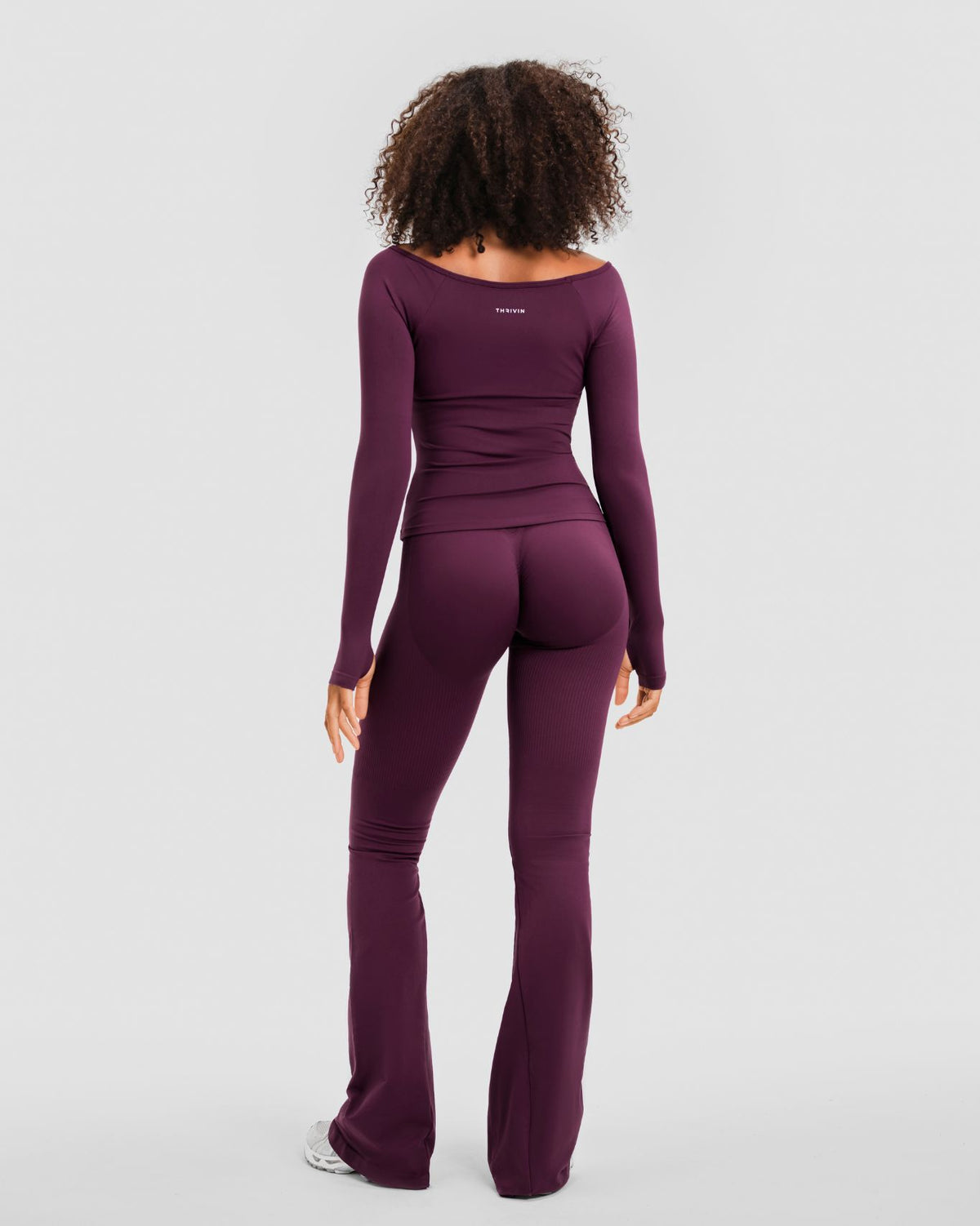 Elevate Sculpting Seamless V-Neck Top in Winter Plum Red, full-length back view with THRIVIN logo and matching flare leggings