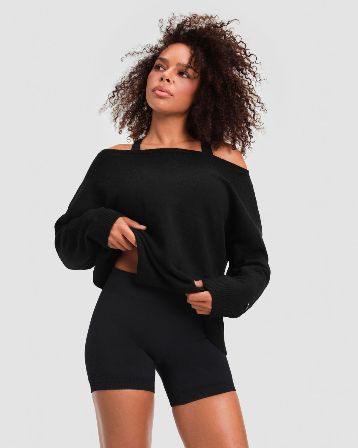 The Essential Collection Off The Shoulder Wool Blend Sweater in Night Black, front view worn off both shoulders