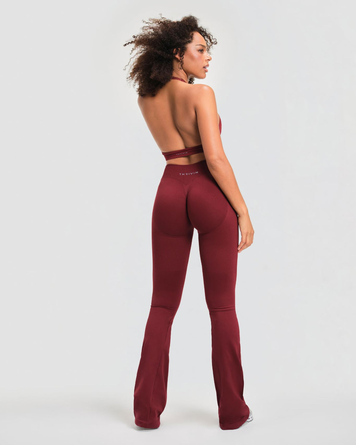 Elevate™ Sculpting Mid V-Waist Flare Leggings | Fine Wine