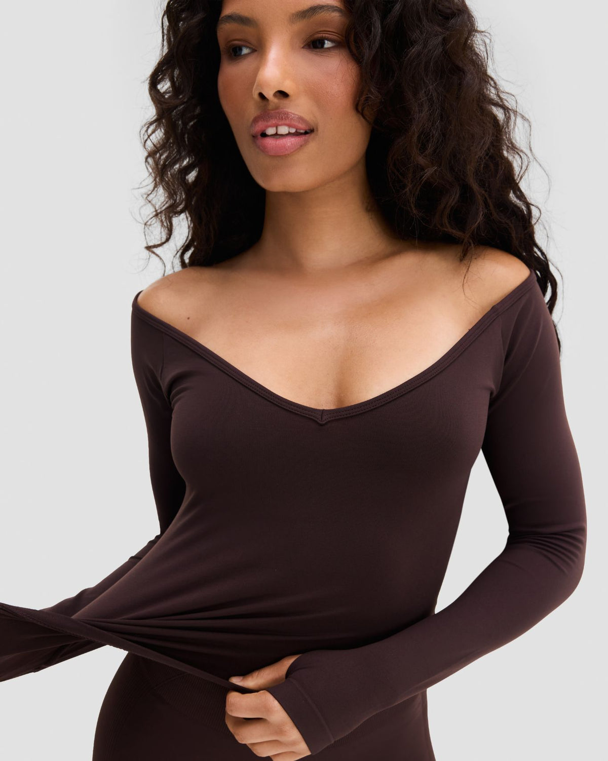 Elevate Sculpting Seamless V-Neck Top in Coffee Brown, front three-quarter view with off-shoulder V-neck