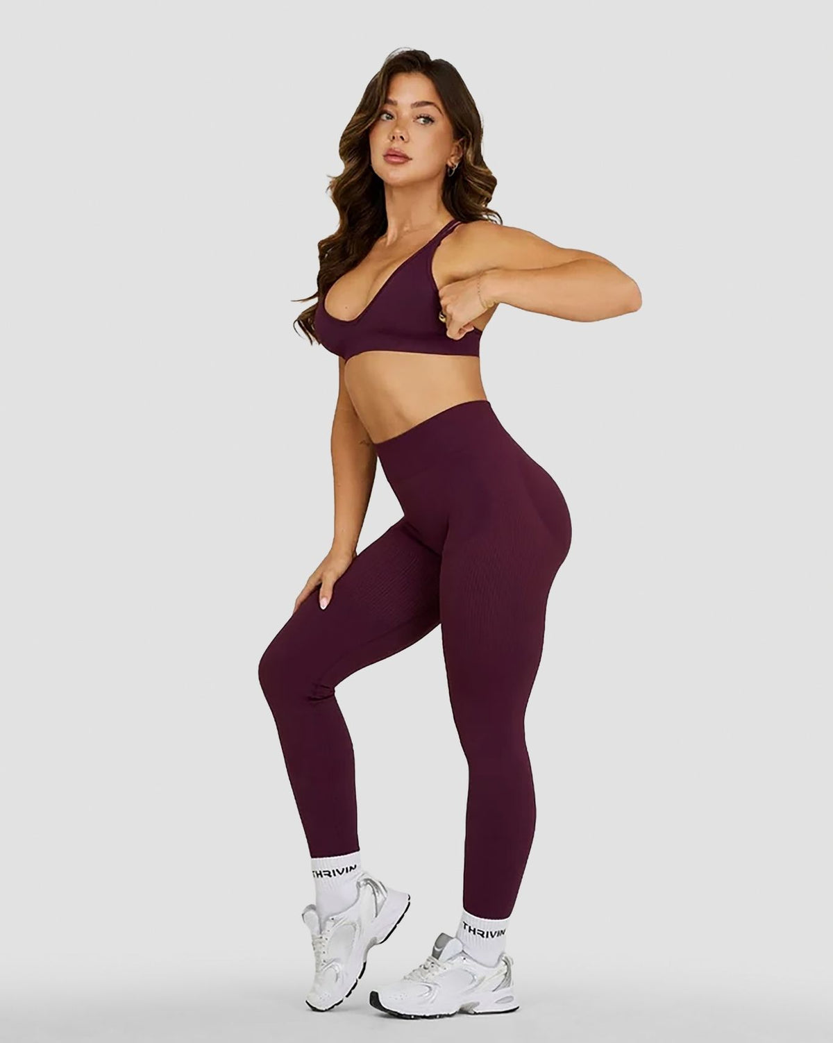 Elevate Sculpting Seamless High Apex Bra in Winter Plum Red, full-length three-quarter front view of cropped seamless fit