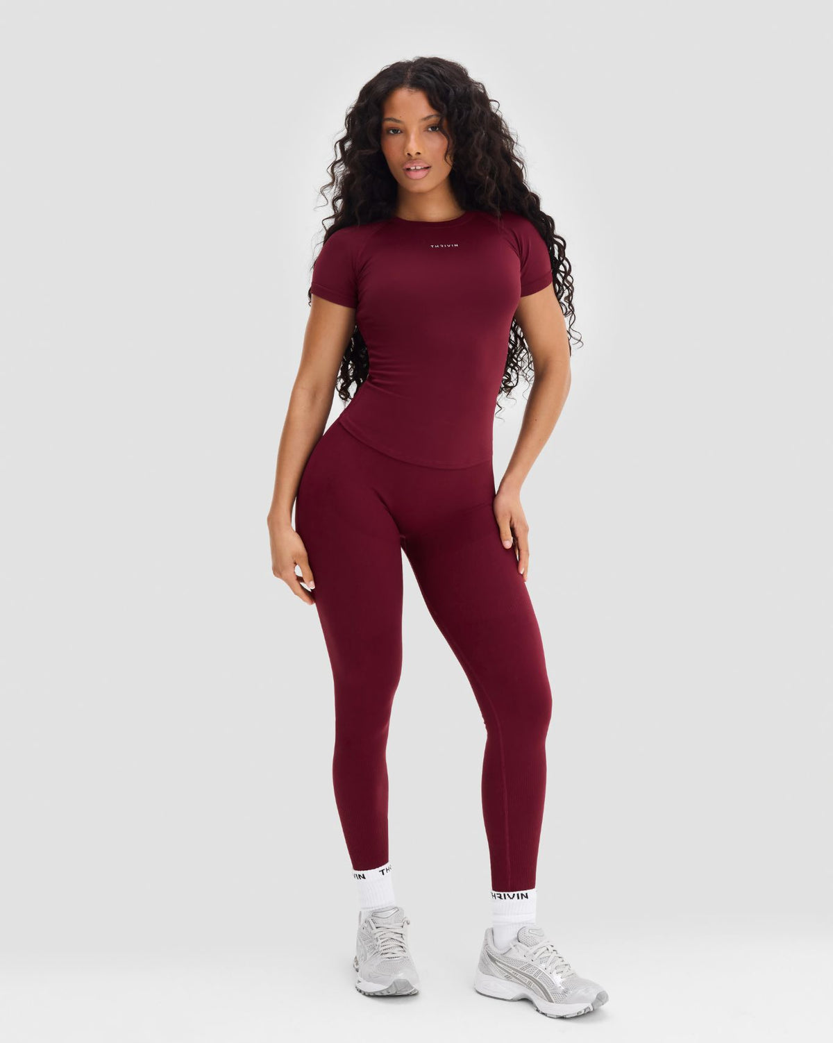 Elevate Compression T-Shirt in Fine Wine Red, full-length front view with matching leggings